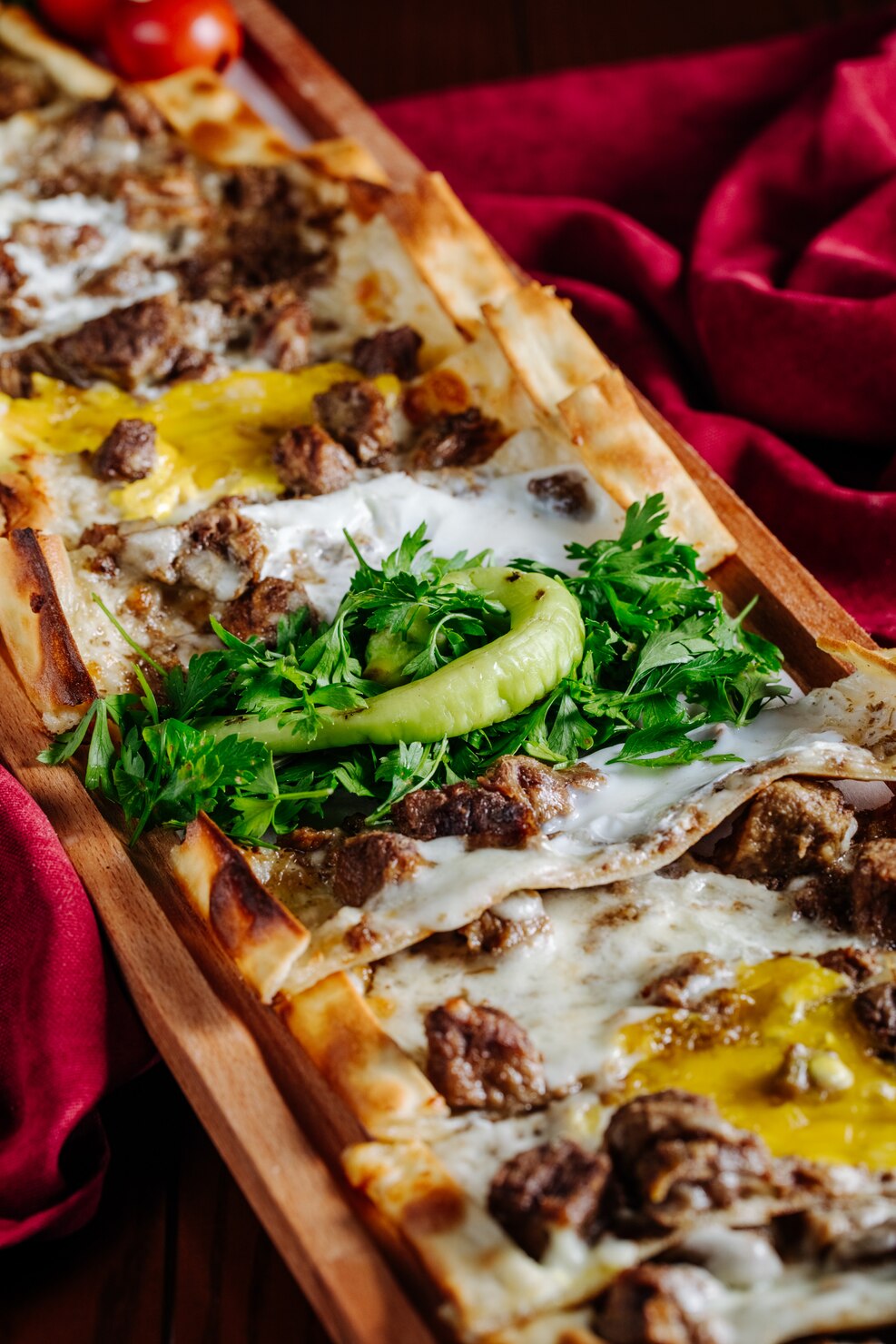 lahmacun slices with meat oily stuff herbs it red tablecloth 114579 2950