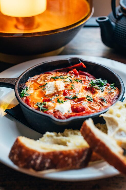 shakshuka iron pan served with bread 651412 3547